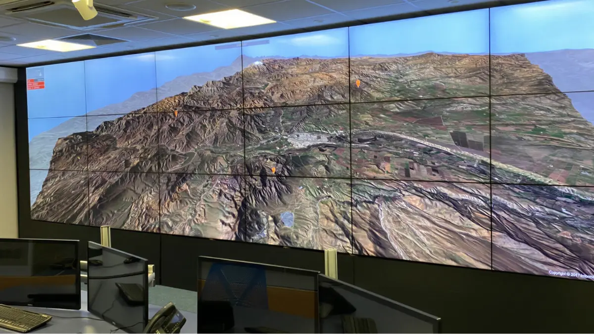 Space mission operations control room with large shared displays